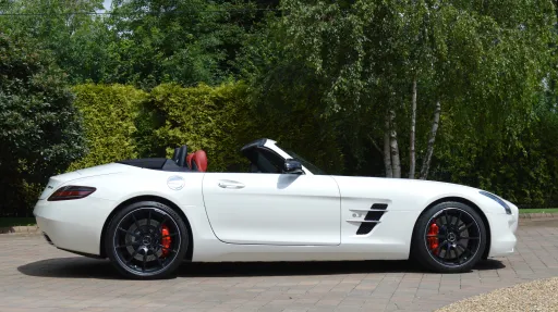 Full right side view of convertible Mercedes with roof down