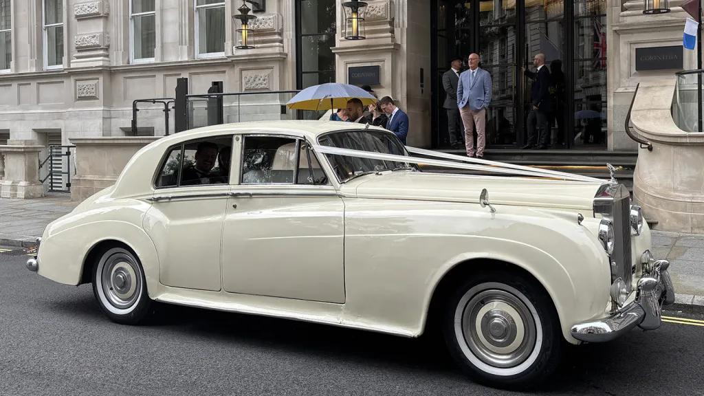 We hired a stunning Rolls-Royce Cloud I for our wedding day, and it was truly one of the highlights of the entire celebration. From the moment it arrived, the car&rsquo;s timeless elegance turned heads, the gleaming bodywork, immaculate interior, and classic style were simply perfect for the occasion.Our driver, Sam, was outstanding. His professionalism, warmth, and attention to detail went far beyond what we expected. Not only did he ensure we travelled in comfort and style, but he also played a genuine part in making the day extra special. After our ceremony, he greeted us with refreshments, which was such a thoughtful touch after the whirlwind of the ceremony. Sam also took fantastic photos for us and knew exactly where to stop for the best backdrops in London, suggesting charming spots we&rsquo;d never have discovered ourselves.Every moment in that car felt special, it wasn&rsquo;t just transportation, it was an experience in itself. The ride was smooth and unhurried, allowing us to take in the excitement and joy of the day.We can&rsquo;t thank Sam and the team enough. If you want luxury, charm, and truly exceptional service for your wedding, this is the perfect choice.