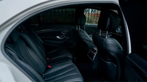 Rear interior inside Mercedes S-Class with Long Wheel Base feature, black leather interior