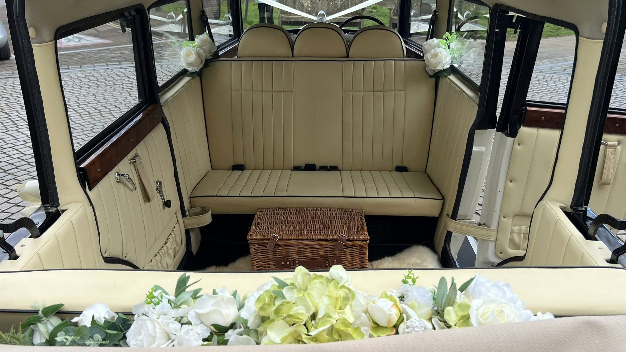 Cream leather interior in Bramwith Limousine with 2 facing bench seats