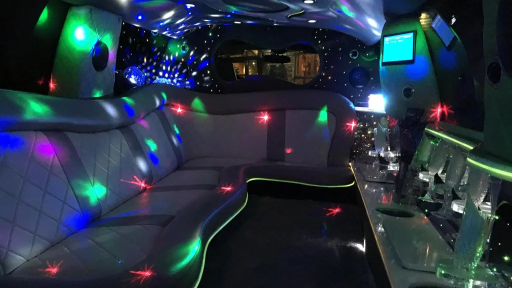 Ford Excursion Stretched Limousine interior illuminated with multi coloured twinkle lights