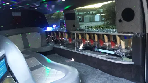 Ford Excursion Stretched Limousine interior with lights, illuminated bar