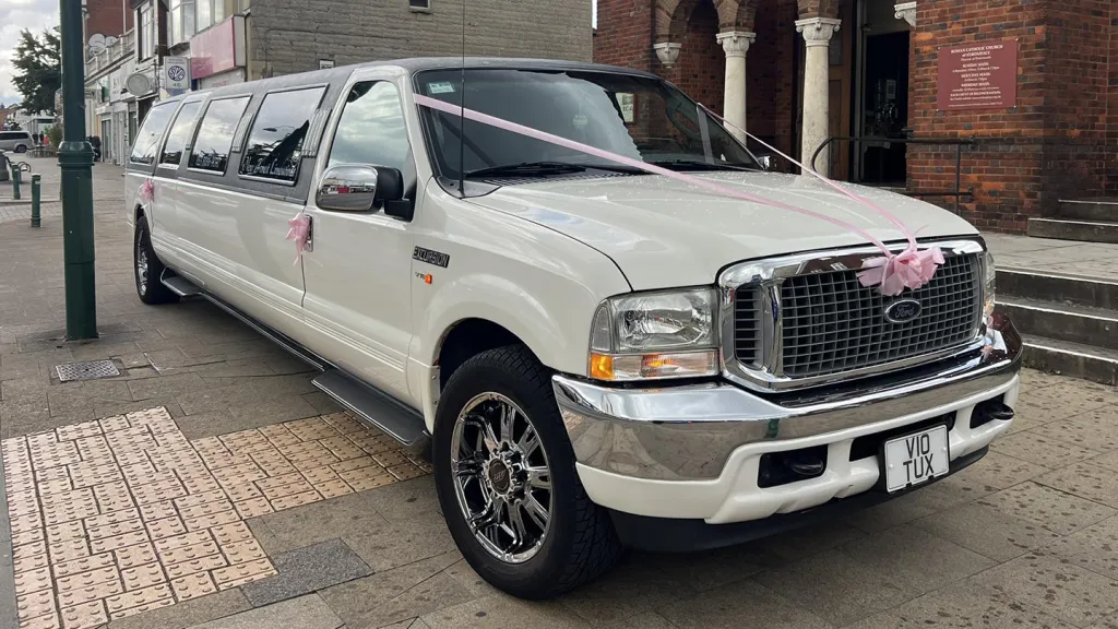 Ford Excursion Stretched Limousine with white ribbons