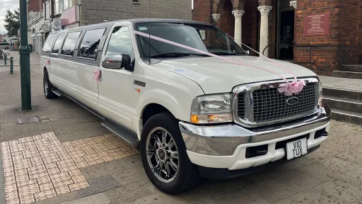 Ford Excursion Stretched Limousine with white ribbons