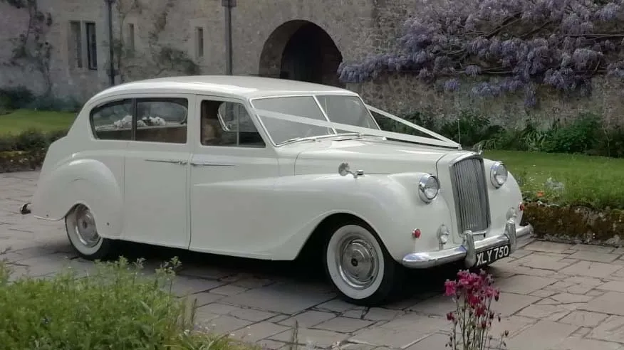 Mark was absolutely charming and made our drives in his beautiful car to the church and then to the wedding reception for the bride and groom a very happy experience. Thank you.