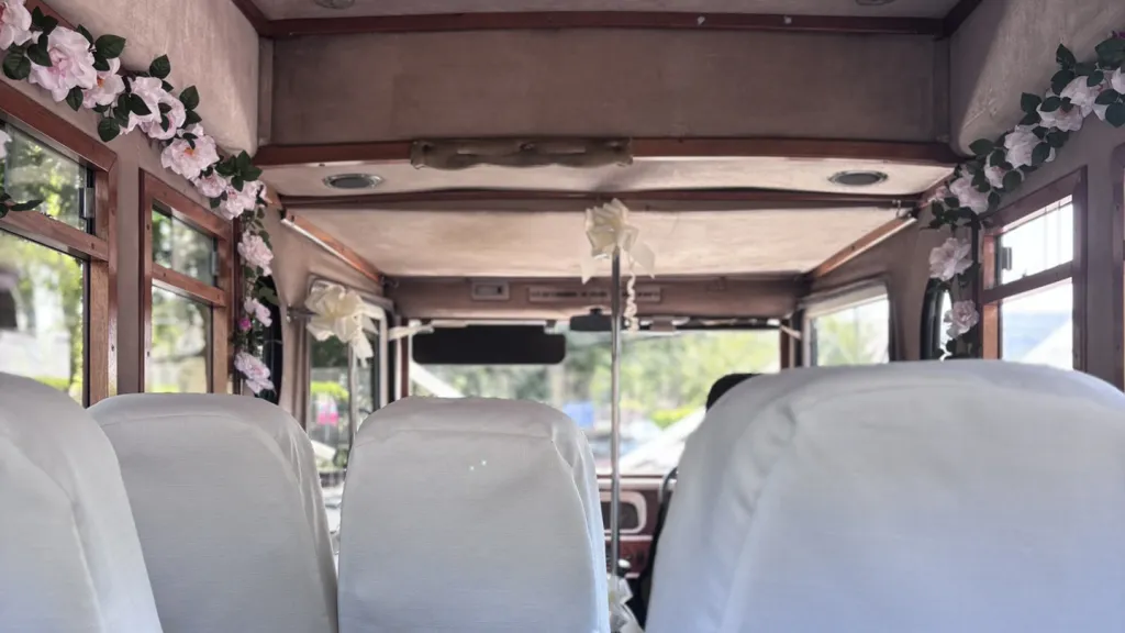 Vintage Style Asquith bus interior with wedding decoration.