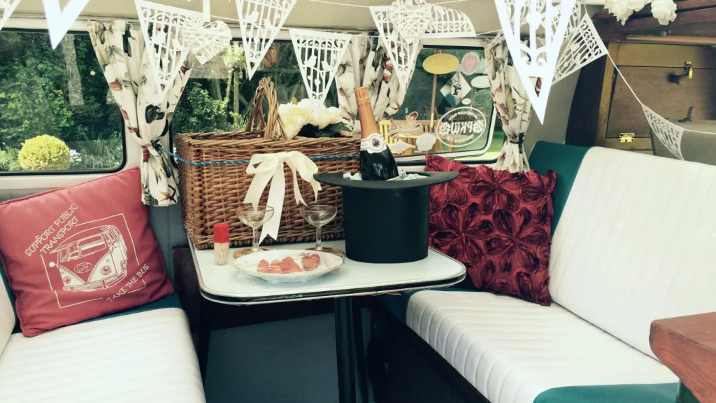 Classic VW campervan interior decorated with wedding decoration