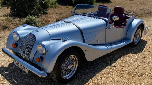 Morgan 4-wheeler in Metallic silver blue with chrome spokes wheels