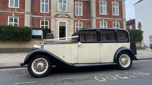 Vintage Rolls-Royce 20/25 parked outside a wedding venue