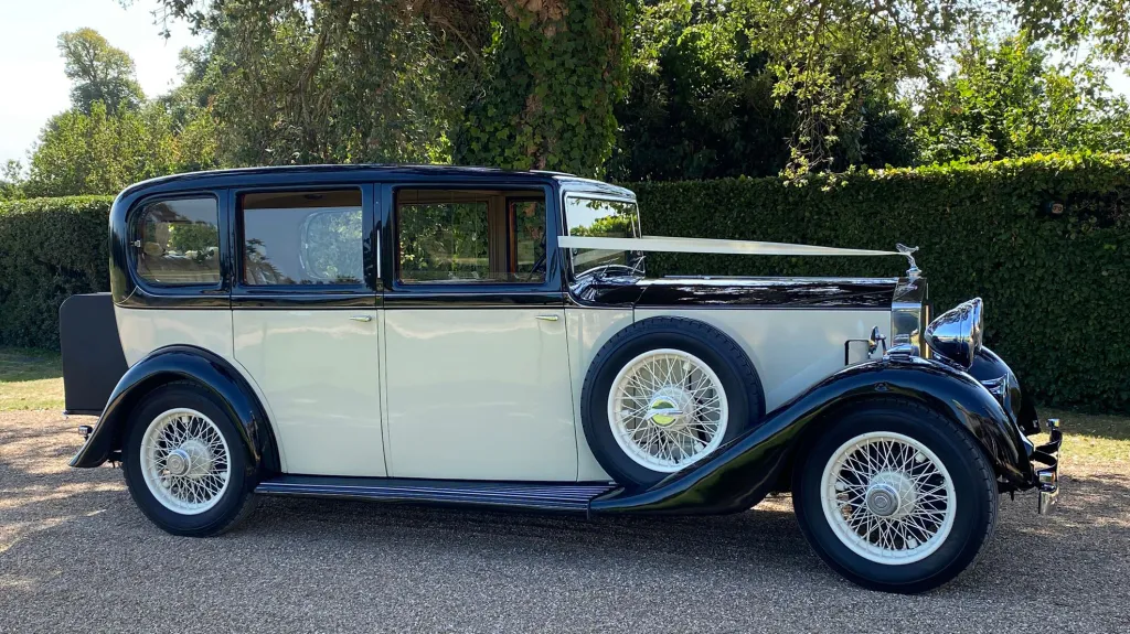 Right side profile of a vintage Rolls-Royce 20/25 on a sunny day