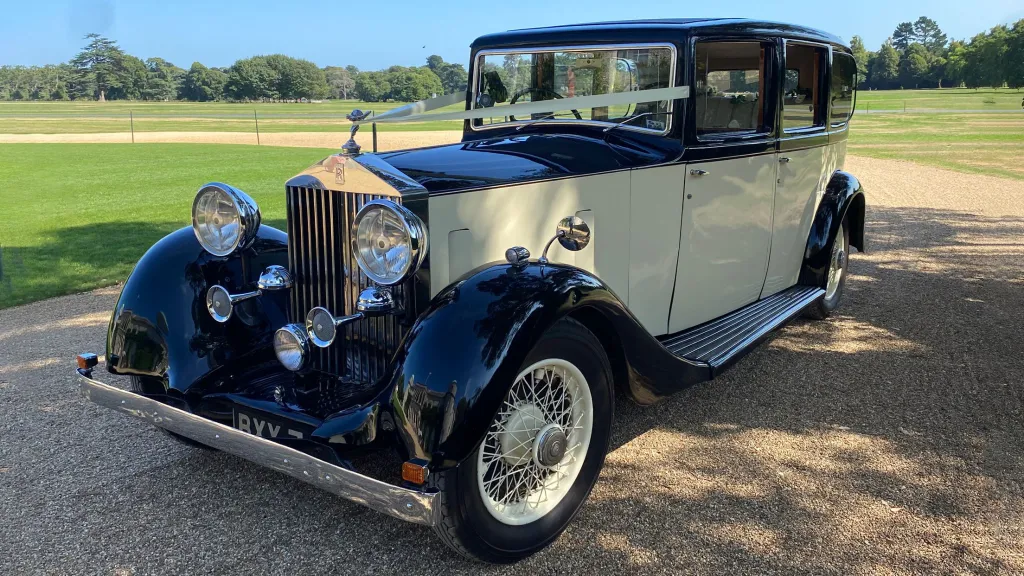 Vintage Rolls-Royce 20/25 driving along a country road