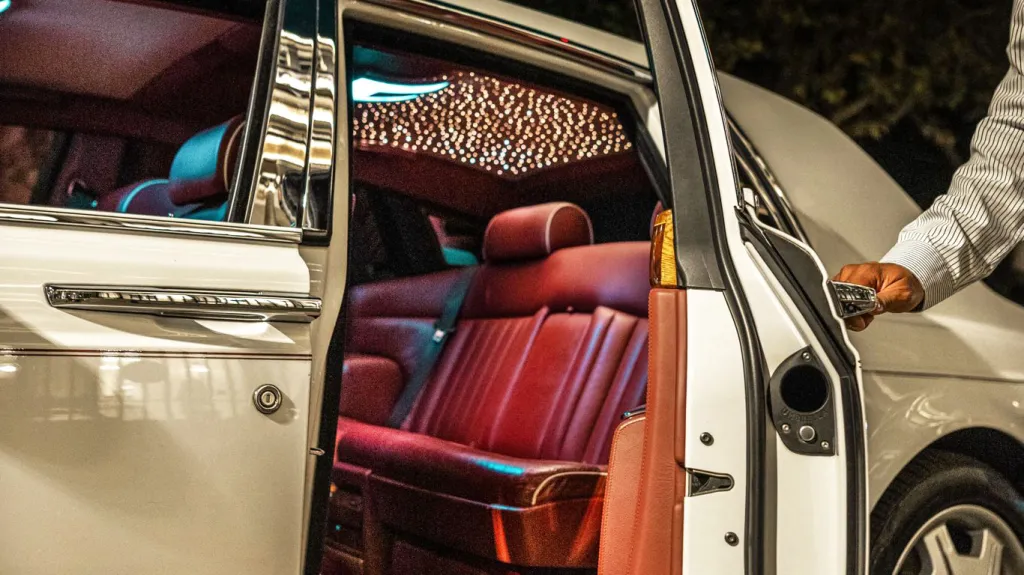 Burgundy leather interior with starlight roof lit up.