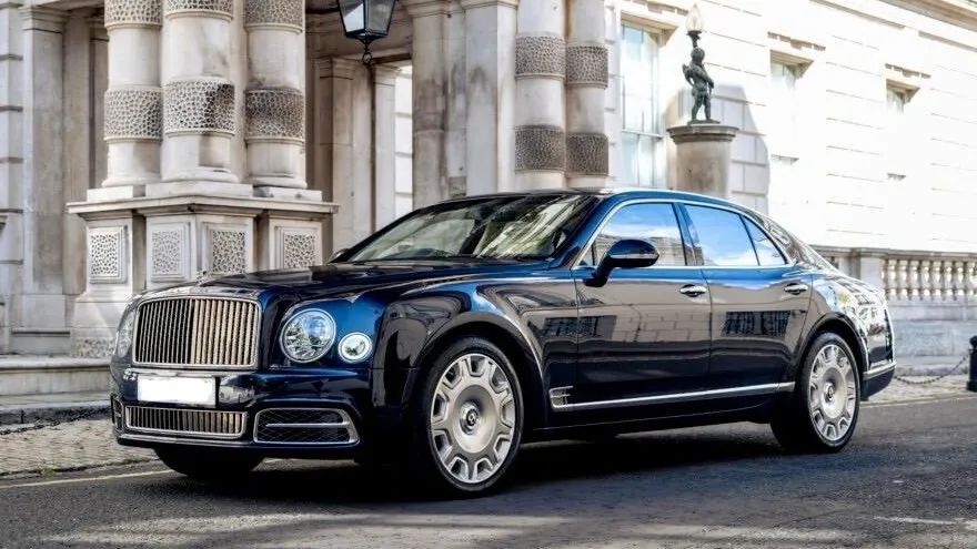 Blue Bentley Mulsanne with large alloy wheels finished in chrome