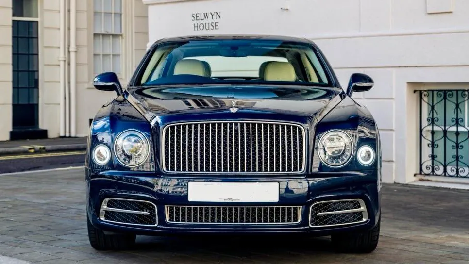 Close-up front view of Blue Bentley Mulsanne with chrome grill