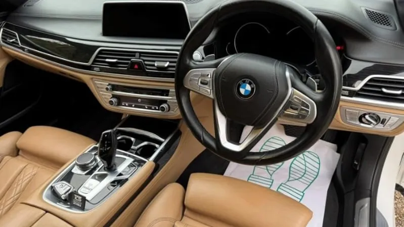 Front interior cream leather seats with dashboard