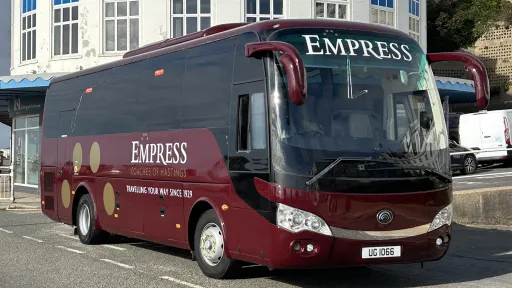 Front right modern wedding bus hire in Brighton, Sussex
