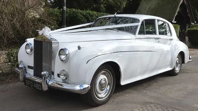 The cars arrived ahead of time and Terry was a calming voice. Beautiful car felt very special travelling to the church and chatting to Terry. Terry was waiting with umbrellas for coming out of church as the weather had changed great experience.