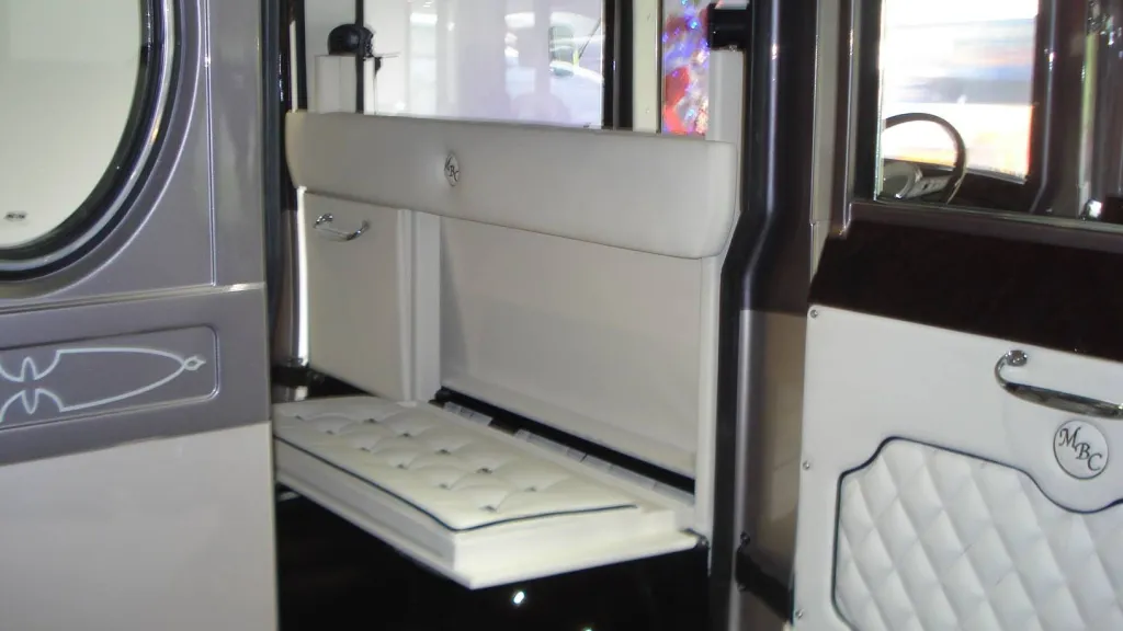 cream leather interior inside a silver imperial wedding car