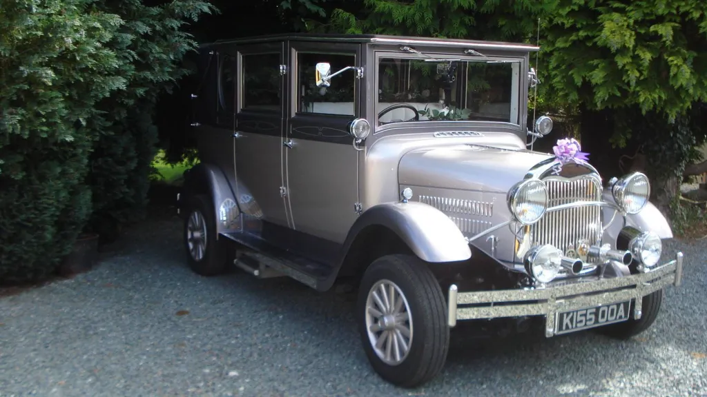 silver imperial wedding car