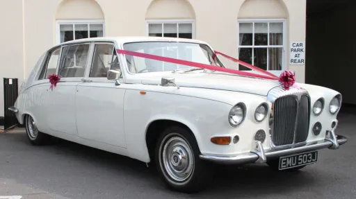 Front right side view Daimler Limousine decorated with Burgundy Ribbons