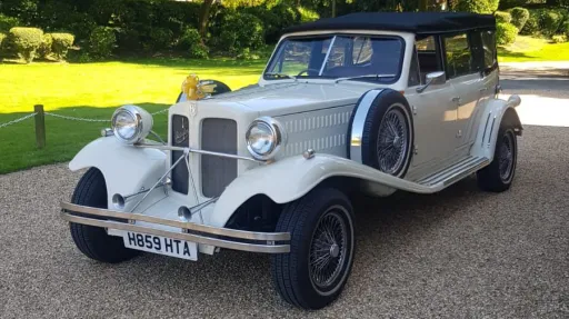 Front three-quarter view of Old English White Beauford 4-door convertible vintage wedding car in Bradford