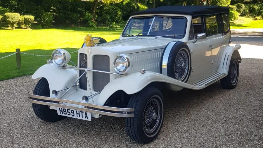Front three-quarter view of Old English White Beauford 4-door convertible vintage wedding car in Bradford