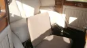 Rolls-Royce Limousine rear cabin interior with casual seats up.