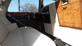 Interior Classic Rolls-Royce Silver Cloud with white leather