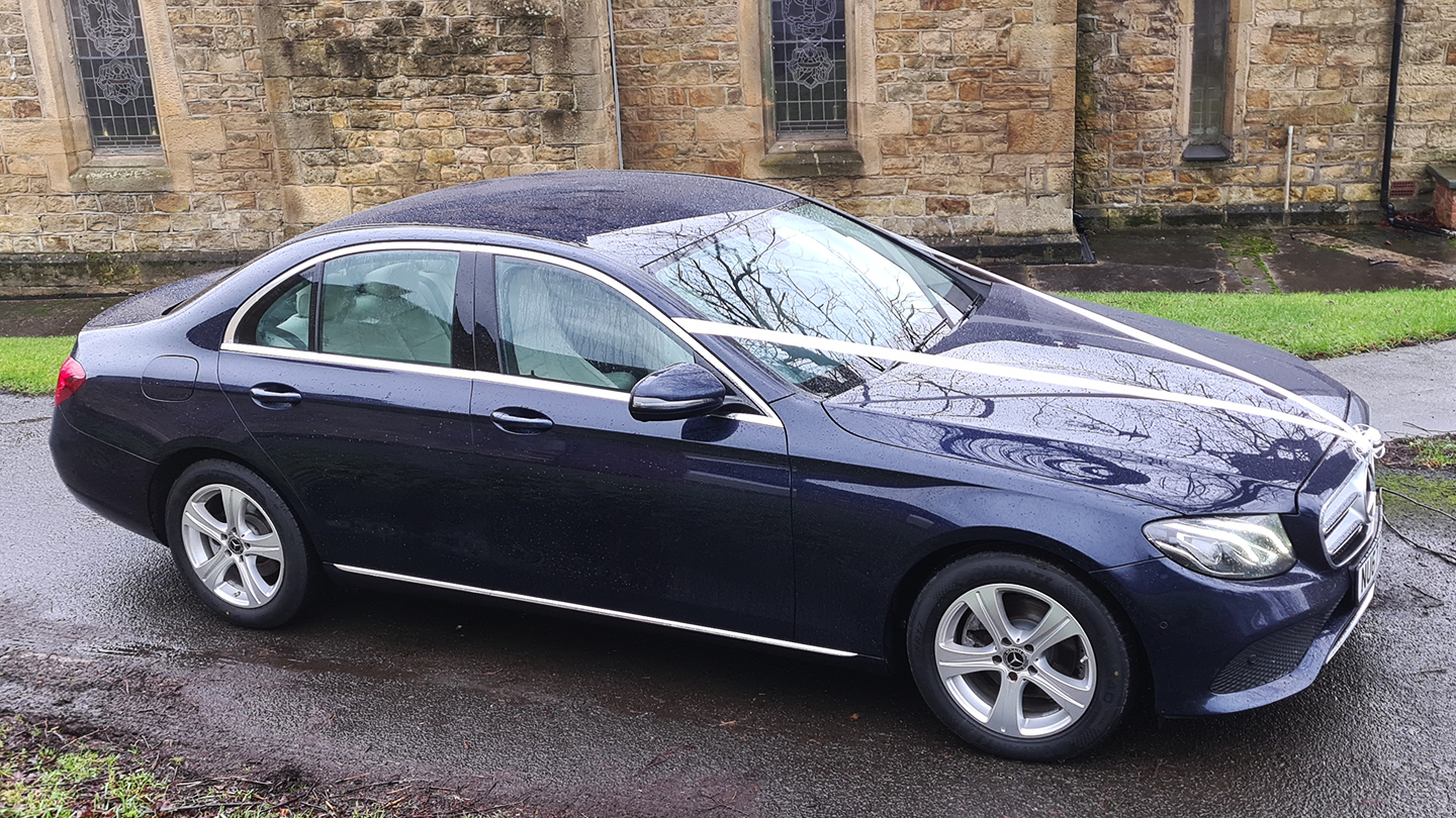 Right side view of a Modern dark blue Mercedes