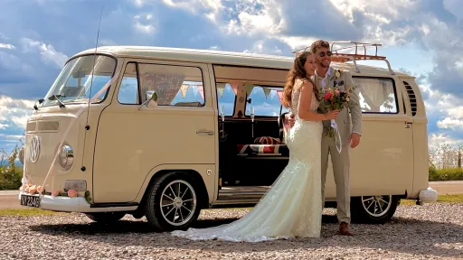 classic vw campervan in cream and white
