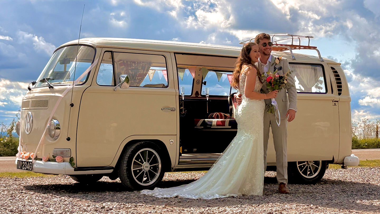 classic vw campervan in cream and white