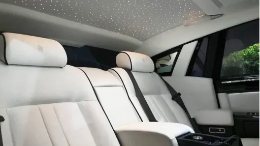 White leatehr interior inside rolls-Royce Phantom with starlight roof