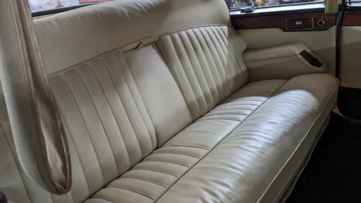 Cream leather rear bench seat inside Daimler Ds420 Limousine