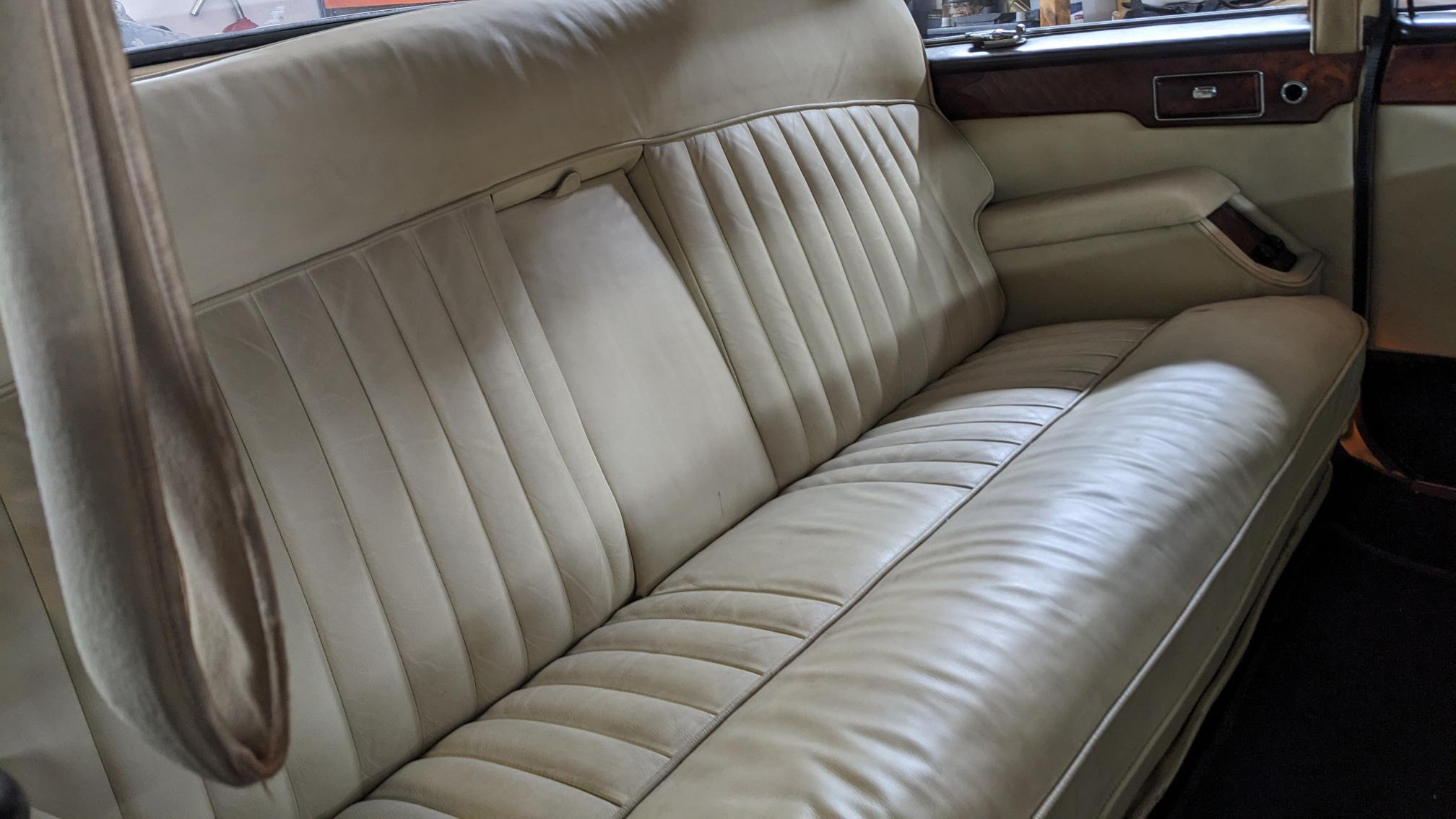Cream leather rear bench seat inside Daimler Ds420 Limousine