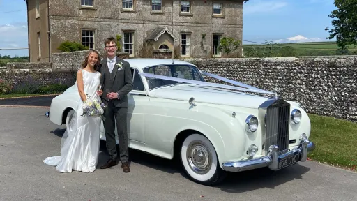 Classic rolls-Royce with Happy married couple