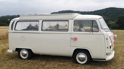 Old English White campervan side profile, doors closed, clean finish, parked outdoors