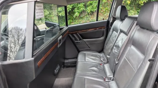 lack leather interior with wooden trim of stretched Vauxhall Vectra limousine