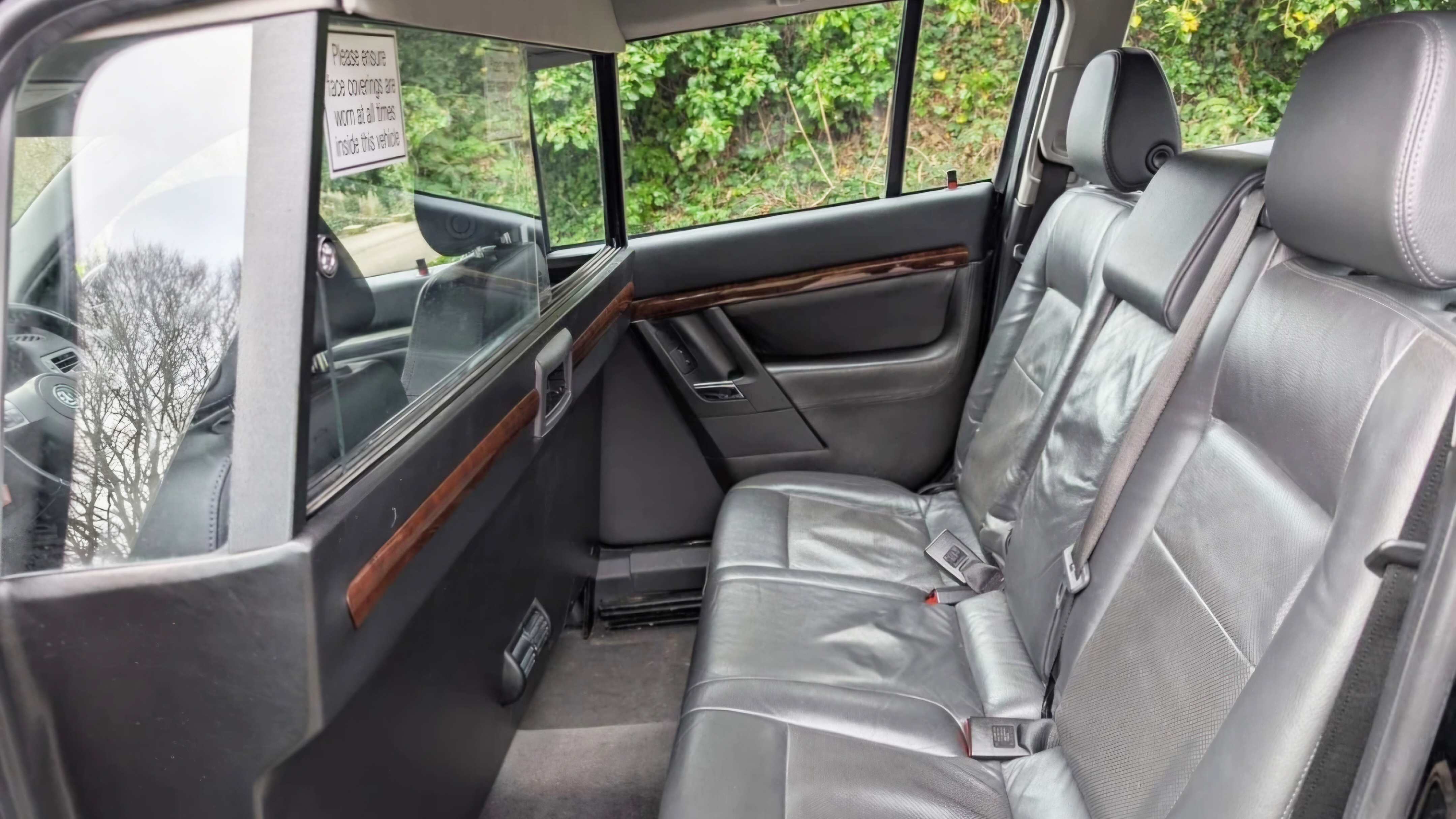 lack leather interior with wooden trim of stretched Vauxhall Vectra limousine