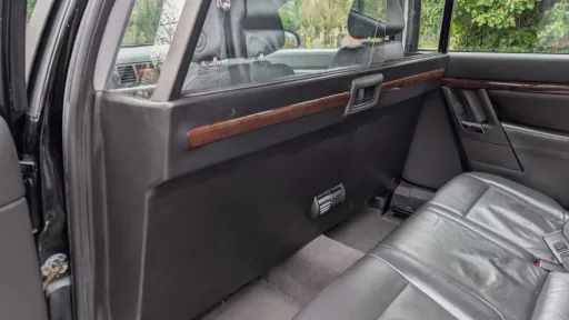 Interior of stretched Vauxhall Vectra limousine showing glass partition