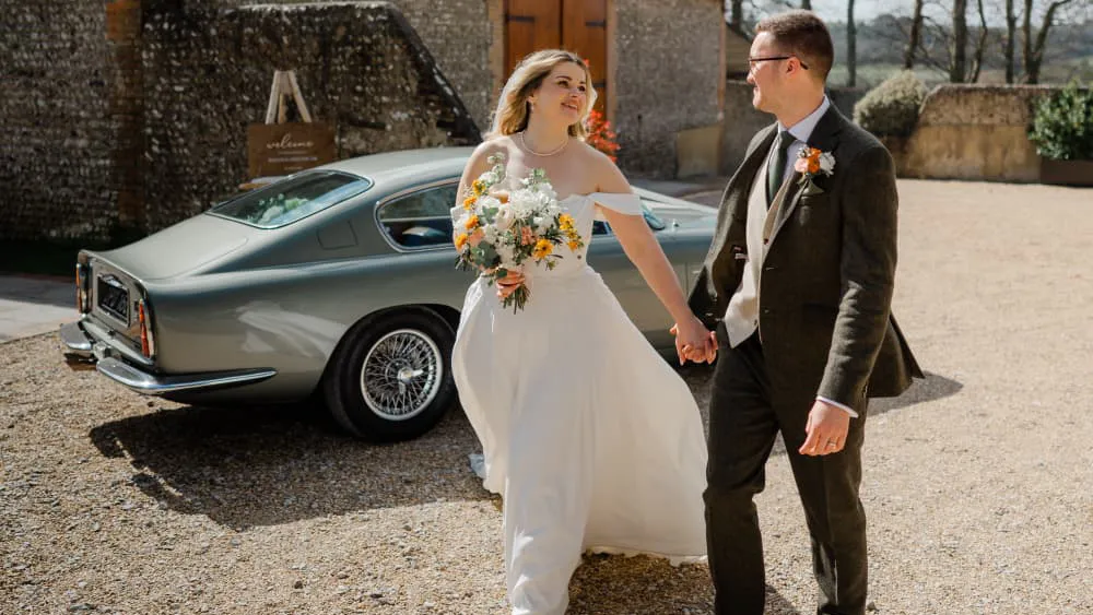 From the moment we booked, the team and Adrian were amazing.The communication was quick and clear. The price was great for the service and the pristine condition of the car.On the day, it could not have gone smoother. The car arrived promptly and right on time. We booked extra time for the photos after the ceremony which looked amazing!I would highly recommend this car and service as it could not have been more perfect.Thank you, Adrian, and your stunning Aston Martin for being part of our day! &nbsp;Oscar &amp; Joanna