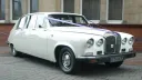 Ivory Classic Daimler Limousine dressed with Ivory Ribbons