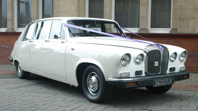 Ivory Classic Daimler Limousine dressed with Ivory Ribbons