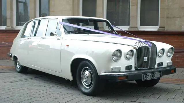 Ivory Classic Daimler Limousine dressed with Ivory Ribbons