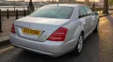 Modern rear view silver Mercedes