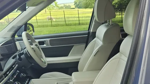 Front cream leather seats and dashboard inside Hyundai Santa Fe Ultimate HEV.