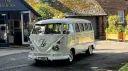 Cream 1972 Volkswagen Split Screen campervan parked outside The Little Fox wedding venue in Liverpool.