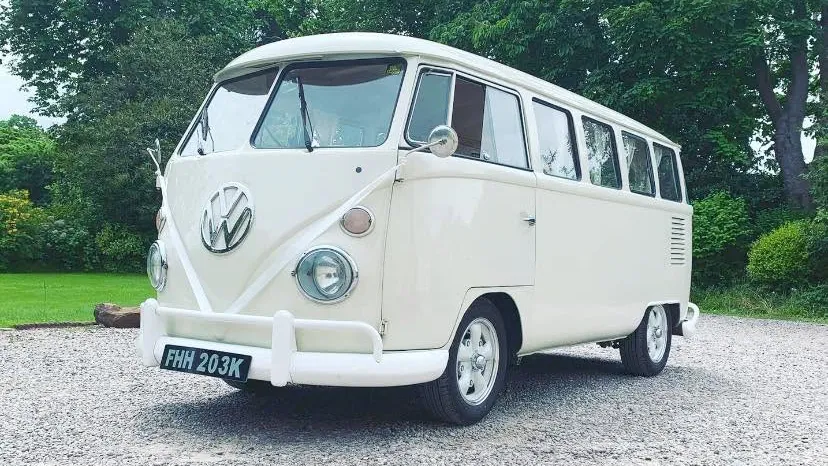 Cream 1972 Volkswagen Split Screen campervan parked on driveway ready for wedding hire in Liverpool.