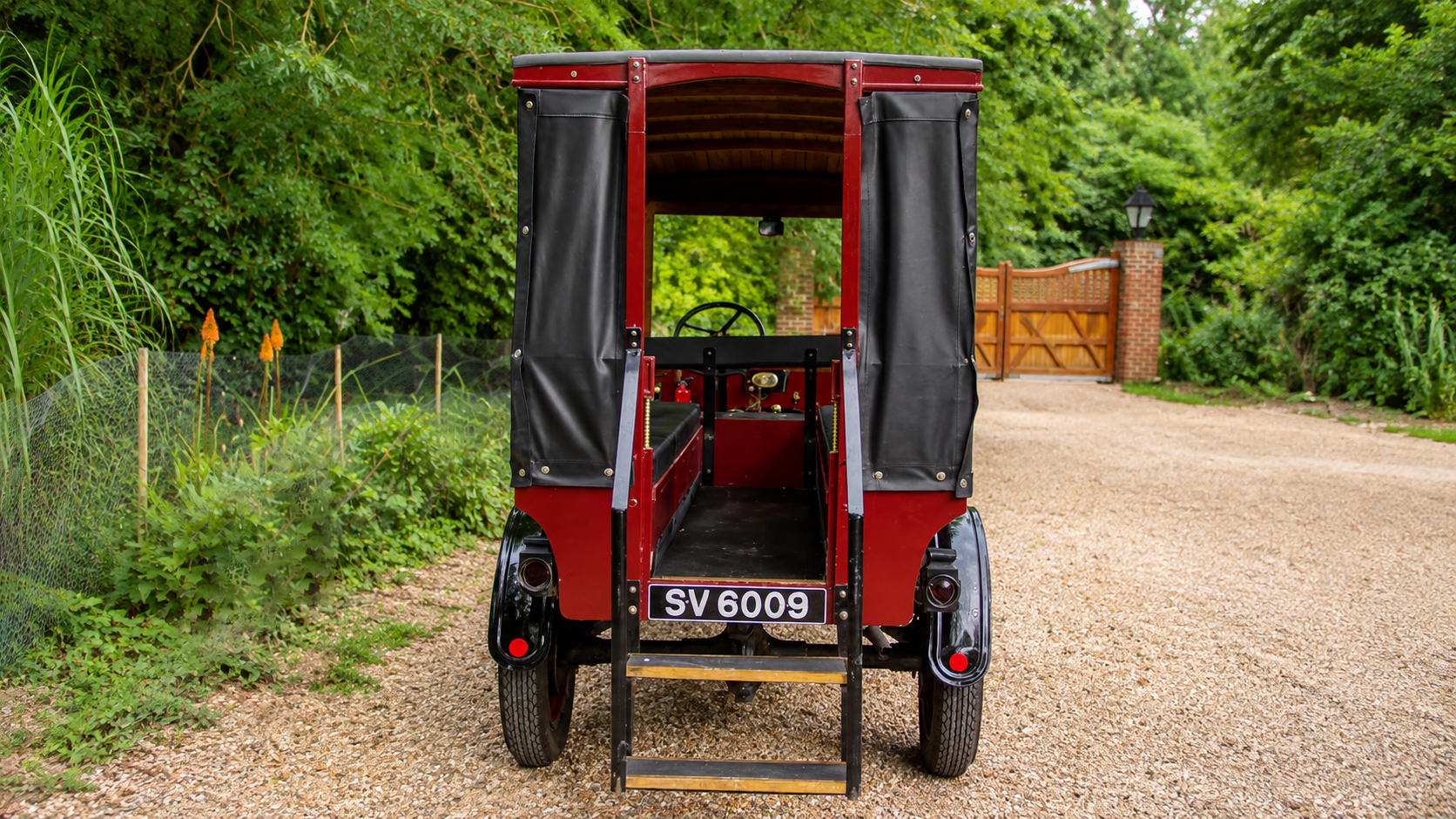 Rear view of vintage Ford Model T Charabanc showing passenger entrance
