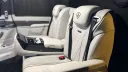 Cream leather forward facing passenger seats inside black Mercedes V-Class Landjets