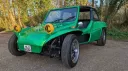 Green 1971 Volkswagen beach buggy wedding vehicle with wide tyres and yellow spotlights